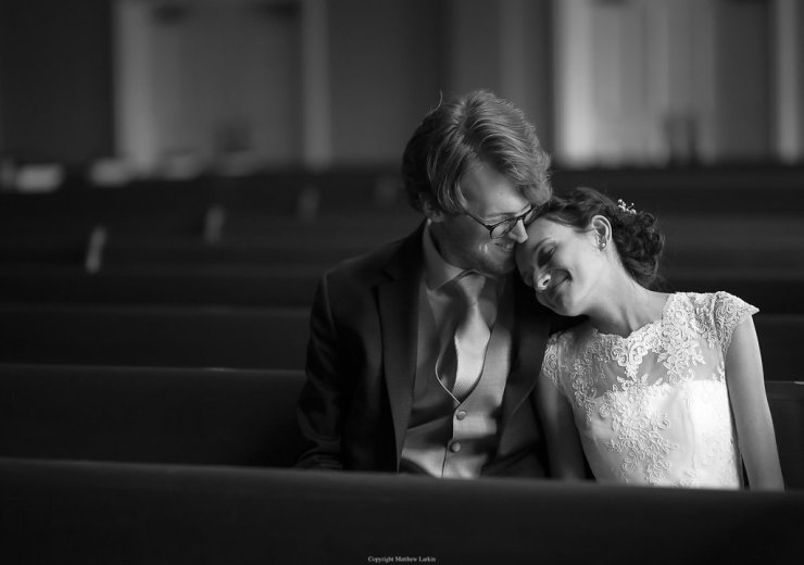 Christian couple in church pew